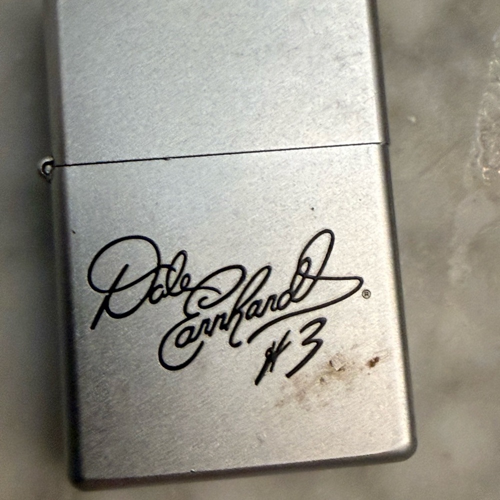 Silver Zippo Lighter with Signature Design